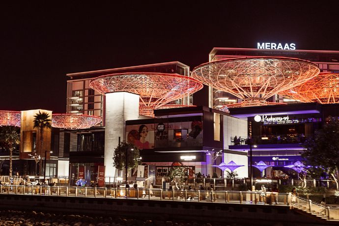 a building with lights in Dubai 