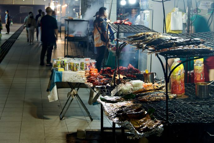 A bunch of food that is on a grill in Brunei