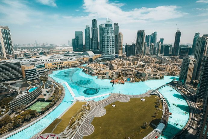 Dubai skyline with a large, blue water feature