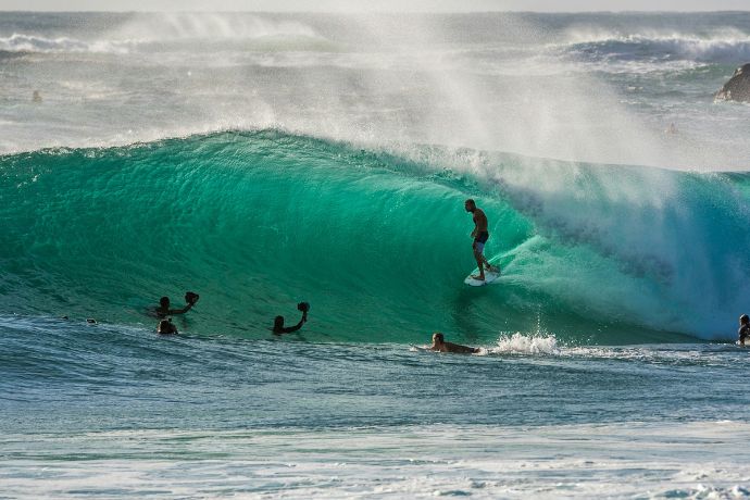People surfing on waves in Duranbah, Australia